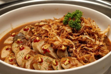 Close Up of Pork Sausage  with Brown Sauceの写真素材