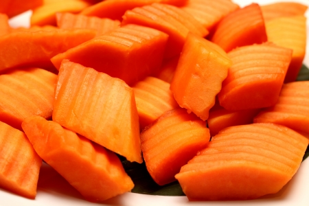 A Tropical papaya fruit slices on plateの写真素材