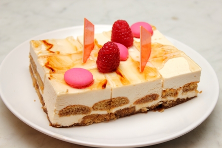 Close up of tiramisu cake with cocoa jelly