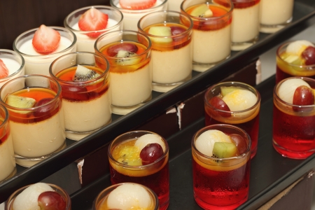 a Panna cotta with fresh fruit in glassesの写真素材