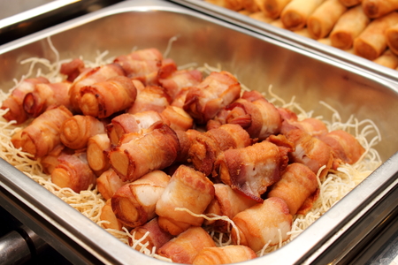 A deep fried sausages rolled in bacon.
の写真素材