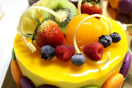 Fresh berry fruit cream cake pastry closeupの写真素材