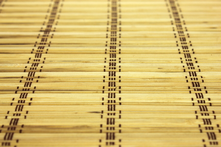 A Table mat made out of bamboo pieces.の写真素材