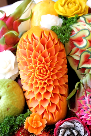 A Closeup the art of papaya carving fruit.の写真素材