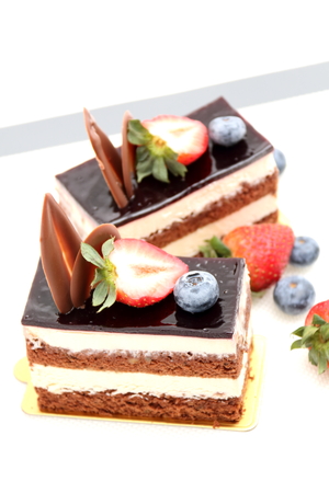 chocolate cake with strawberry on white backgrondの写真素材