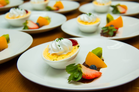 Dessert food on white plate with texture background.