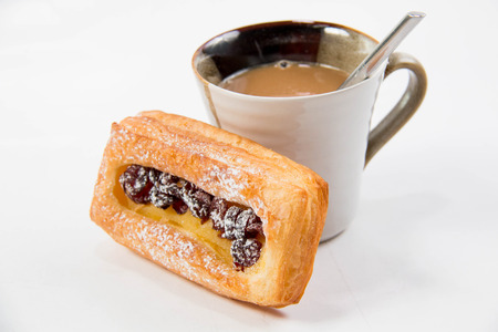 A Cup of coffee and danish pastry.の写真素材