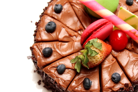 A Chocolate cake with fresh fruit decoration.の写真素材