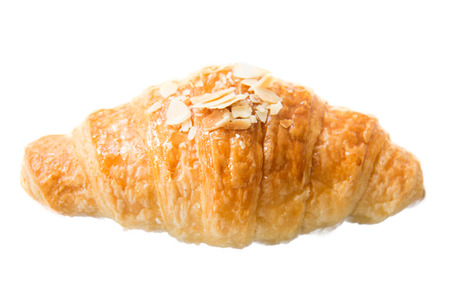 Fresh delicious croissant isolated over white background.の写真素材