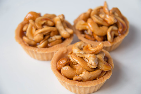 mini Tart cashewnut on a white background.の写真素材