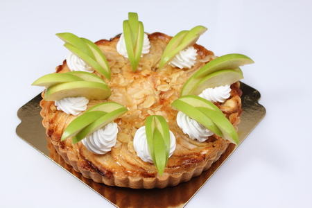 Closeup of a beautiful homemade apple pie with fresh appleの写真素材