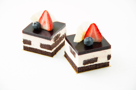 A white chocolate mousse cake on white  background