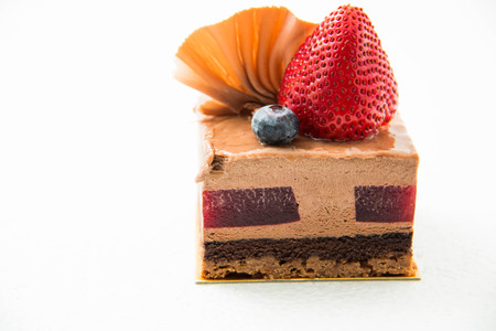 dark  chocolate mousse cake on white  backgroundの写真素材