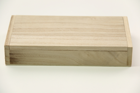 A small wooden box isolated on white. .の写真素材