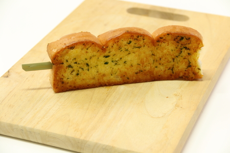 The bread with garlic on the wood cuttingの写真素材