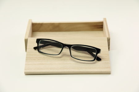 A fream Spectacles eyeware on wood boxの写真素材