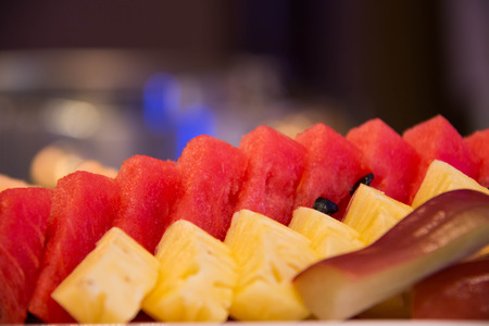 A background Mixed fresh prepared fruit salad.の写真素材