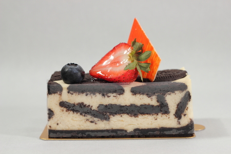 Oreo cream Cheese Cake on white background.