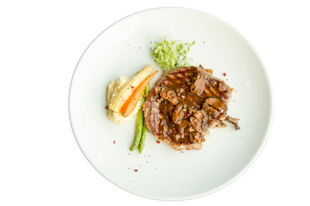 Gourmet style veal sirloin steak, served with asparagus, grilled carrotの写真素材
