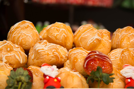 Tasty and sweet eclair with stuffingの写真素材