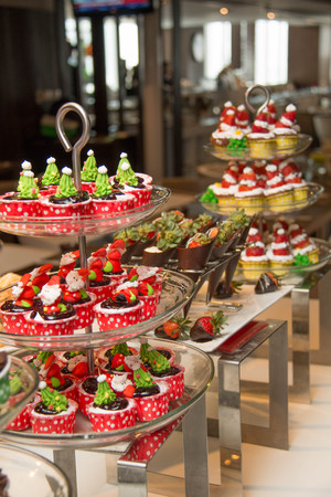 Various dessert with fresh fruit on buffet line, sweetの写真素材