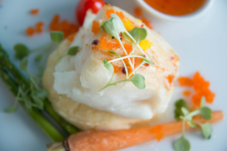 Gourmet Main Entree Course Grilled Snow Fish with  sauce.