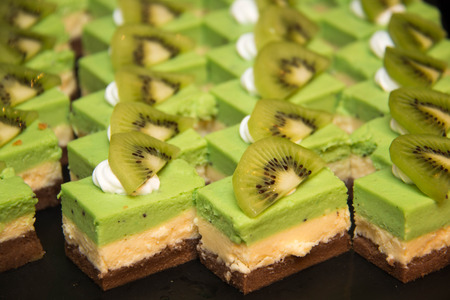 kiwi Tasty light cheesecake decorated with fresh  kiwiの写真素材