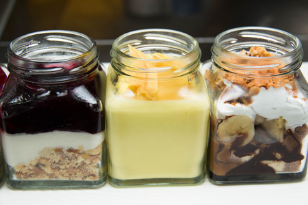 Dessert blueberry banoffee and cheese in a glass bottleの写真素材