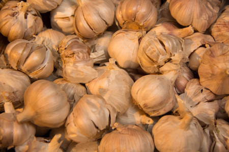 A Garlic cloves at market; texture background.の写真素材