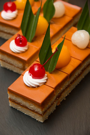 Close up shot of thai tea cake on standの写真素材
