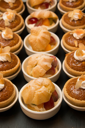 A Close up of Tasty Miniature Decorative Dessertsの写真素材