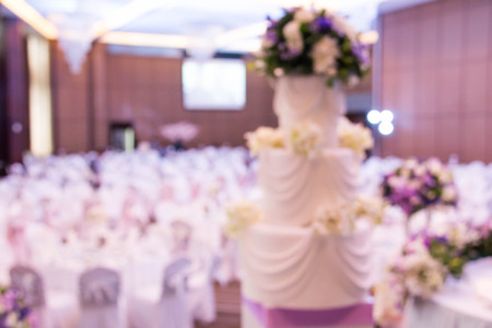 Large dining table set for wedding with blur background
