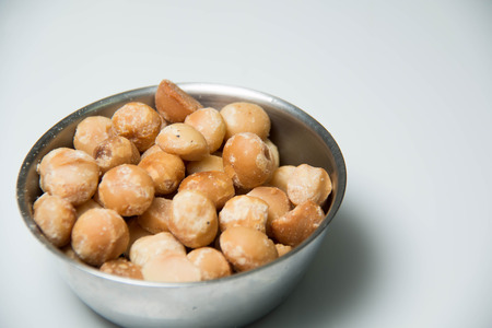 A Macadamia Nut in isolated white backgroundの写真素材