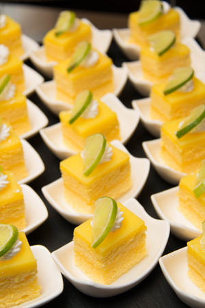 mini Lemon cake  on a white plate.の写真素材