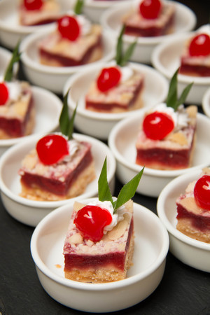 Mini tarts  cherries decorated cherry  on topの写真素材