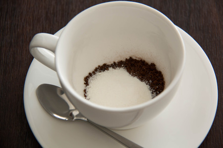 coffee cup  view on white wood table backgroundの写真素材