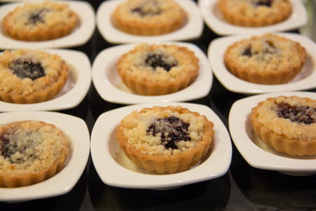A Chocolate Cherry Mini Tartlets with crumble
