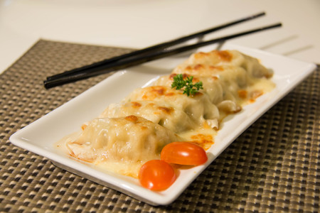 gyoza Dumplings bake cheese Traditional Asian Food, Stuffed with Pork Meat or Vegetables
の写真素材