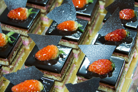 A Chocolate cake with strawberry on top