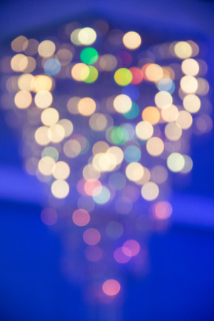 Blurred, bokeh lights background. Abstract blue sparkles.の写真素材