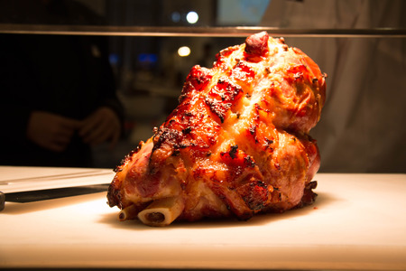 delicious whole baked ham Christmas decoration on woodの写真素材