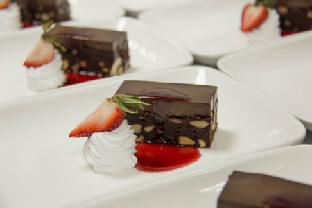 Tasty vegetarian brownie slice on plate table for celebration.の写真素材