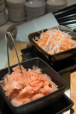 Picked ginger in a bowle on buffetの写真素材