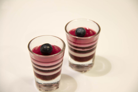 A Jelly in glass with fruit blueberry  on topの写真素材