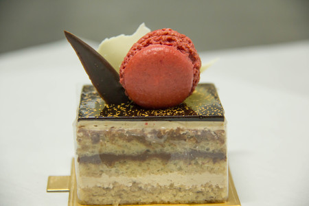 Rich a chocolate cake with macaroon topping.