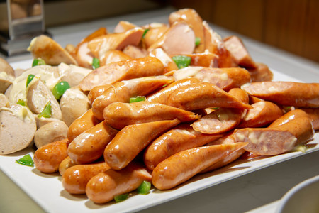 A mixed sausage on buffet in hotelの写真素材