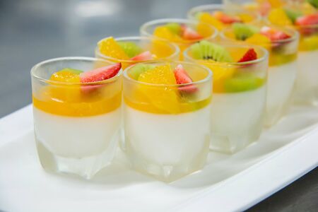 A delicious fruit panna cotta in small glassの写真素材