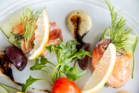 A mixed Salmond salad on white plateの写真素材