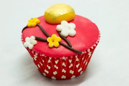 A cup cake Chinese style on whiteの写真素材