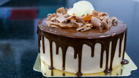 A chocolate cake on top chocolate ganacheの写真素材